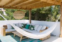 Handcrafted wooden outdoor lounge group on contemporary terrace